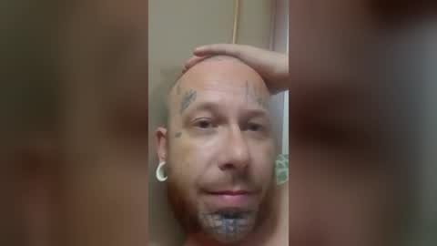 Snapshot of tattootravis chatting on 07.15.26 tattootravis online show from 07.15.26