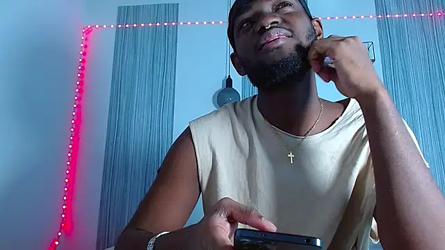 Snapshot of eebony_stallion chatting on 12.02.25 eebony stallion online show from 12.02.25